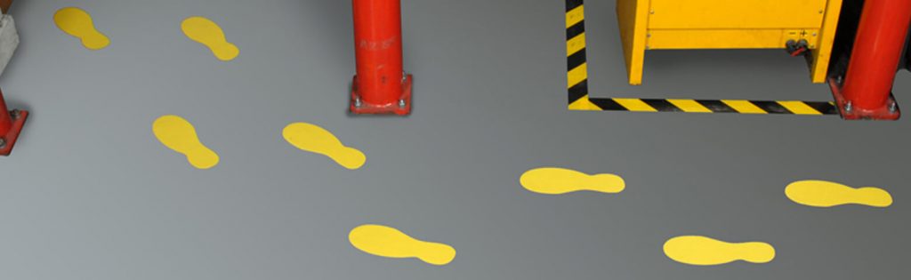 Industrial-Floor-Marking-Die-Cut-Feet-Applied-to-Warehouse-Floor