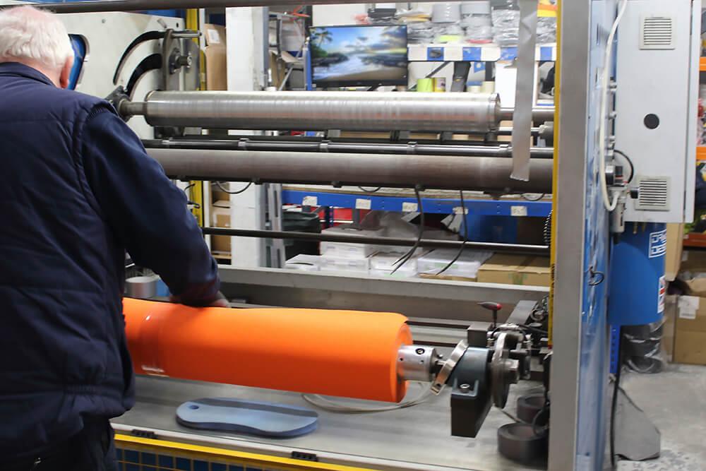 Orange Anti-Slip Material being Cut on a Crush Cutter into Rolls of Non Slip Tape 3