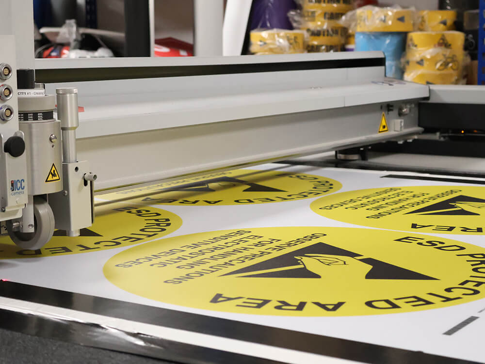 ESD Floor Sign Being Cut by Custom Shape Die Cutting Machine 2
