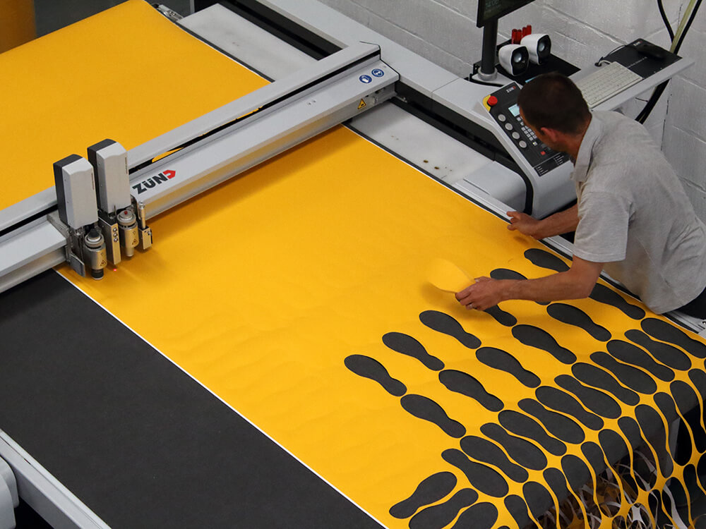 Zund Digital Die Cutting Machine Cutting Yellow Non Slip Material into Shoe Shapes 3